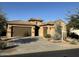 Charming single-story home featuring a tile roof, a three-car garage, and desert landscaping at 1708 W Dusty Wren Dr, Phoenix, AZ 85085