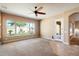 Light-filled living area with a sliding door to the outside at 1708 W Dusty Wren Dr, Phoenix, AZ 85085