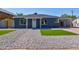 Charming single-story home featuring a gravel yard, new grass, and a covered carport at 171 W Tulsa St, Chandler, AZ 85225