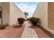 Yard featuring a desert plants, and a brick walkway leading through the yard at 1725 W Marlette Ave, Phoenix, AZ 85015