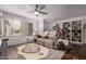 Comfortable living room showing the layout with a large window and neutral tones at 1725 W Marlette Ave, Phoenix, AZ 85015