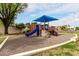 Community playground with slides, climbing structures, and shaded area for outdoor recreation at 1725 W Marlette Ave, Phoenix, AZ 85015