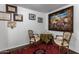 Cozy seating area with decorative chairs and a side table at 1725 W Marlette Ave, Phoenix, AZ 85015