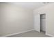 Bedroom featuring a sliding door closet and neutral finishes for a clean look at 17735 W Brown St, Waddell, AZ 85355