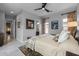 Inviting bedroom featuring a comfortable bed, stylish decor, and plenty of natural light at 18016 E Wolf Tree Ln, Rio Verde, AZ 85263