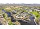 Aerial of community park with playgrounds, ponds, and walking paths in a scenic setting at 1828 W Hemingway Ln, Anthem, AZ 85086