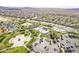 Aerial view featuring a community park with skate park, playgrounds, and parking at 1828 W Hemingway Ln, Anthem, AZ 85086