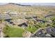 Aerial view of community park with playgrounds, multiple ponds, and lush landscaping at 1828 W Hemingway Ln, Anthem, AZ 85086