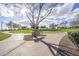 Scenic park view with a bench beneath a tree, offering a tranquil spot for relaxation and enjoying the outdoors at 1828 W Hemingway Ln, Anthem, AZ 85086