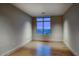 Bright bedroom with wood floors and a large window showcasing beautiful mountain views at 18720 N 101St St # 3021, Scottsdale, AZ 85255