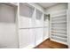 Well-organized closet with adjustable shelves and hanging rods maximizes storage space and convenience at 18720 N 101St St # 3021, Scottsdale, AZ 85255