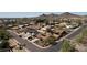 Expansive aerial view of a neighborhood with mountain views, showcasing the desirable community and picturesque surroundings at 1920 E Manzanita Dr, Phoenix, AZ 85020