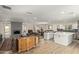 Expansive living space blending modern kitchen, dining area, and cozy fireplace living room at 1974 E Vinedo Ln, Tempe, AZ 85284