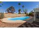 Backyard showcases a refreshing pool with patio and privacy wall at 1974 E Vinedo Ln, Tempe, AZ 85284