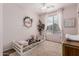 Pink bedroom with white ceiling fan, leopard rug, and twin bed with a cow print blanket at 20916 E Desert Hills Blvd, Queen Creek, AZ 85142