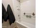 Clean, bright bathroom features a tiled shower-over-tub and modern fixtures at 2228 N 52Nd St # 117, Phoenix, AZ 85008