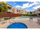 Community pool and lounge area with comfortable seating at 2228 N 52Nd St # 117, Phoenix, AZ 85008