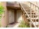 Condo entrances featuring white security doors and stairwell to upper units at 2228 N 52Nd St # 117, Phoenix, AZ 85008