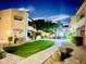 Exterior view of modern, well-maintained apartment buildings with manicured lawns at 2228 N 52Nd St # 117, Phoenix, AZ 85008