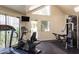 Well-equipped fitness center with modern exercise machines, fitness equipment, and ample lighting at 2228 N 52Nd St # 117, Phoenix, AZ 85008