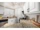 Well-lit kitchen features granite countertops and white cabinetry at 2228 N 52Nd St # 117, Phoenix, AZ 85008