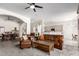 Cozy living room leading to dining area and kitchen, perfect for entertaining and everyday living at 2450 E Glass Ln, Phoenix, AZ 85042