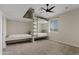 Bunk room featuring built-in beds, ladder, and a window with natural light at 2457 W Phillips Rd, Queen Creek, AZ 85144