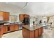 Well-lit kitchen featuring granite countertops, stainless steel appliances, and lots of cabinet space at 2923 N 63Rd St, Mesa, AZ 85215