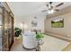 Stylish living room with a large window, a modern ceiling fan, and a tiled floor at 2923 N 63Rd St, Mesa, AZ 85215