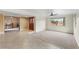 Inviting living room with tile floors, neutral walls, a ceiling fan, and natural light at 2923 N 63Rd St, Mesa, AZ 85215