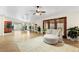 Inviting living room with tile floors, a ceiling fan, and a view of the backyard at 2923 N 63Rd St, Mesa, AZ 85215