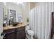 Bathroom featuring granite countertops, vessel sink, and tub shower at 32754 N 15Th Gln, Phoenix, AZ 85085