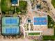 Aerial view of community tennis and basketball courts with beautiful landscaping at 32754 N 15Th Gln, Phoenix, AZ 85085