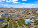 Aerial shot showcasing a community pool, green spaces, and ample parking at 32754 N 15Th Gln, Phoenix, AZ 85085