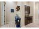 Inviting hallway with decor, cabinets and hard surface floors at 32754 N 15Th Gln, Phoenix, AZ 85085