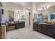 Luxurious main bathroom with dual vanities, granite countertops, and a spa-like ambiance at 32754 N 15Th Gln, Phoenix, AZ 85085