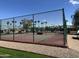 Well-maintained tennis court with fencing, offering a great amenity for active residents at 328 E Aztec Blvd, Mesa, AZ 85205