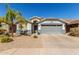 Charming single-story home featuring a well-maintained front yard and a two-car garage at 3284 W Five Mile Peak Dr, San Tan Valley, AZ 85144