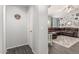 View of a hallway leading into a living area featuring gray walls and wood look floors at 3284 W Five Mile Peak Dr, San Tan Valley, AZ 85144