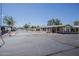 Community entrance with a gate and yellow speed bumps at 3330 E Main St # 7, Mesa, AZ 85213