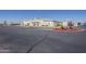 Exterior of community center with ample parking on a clear day under a blue sky at 3330 E Main St # 7, Mesa, AZ 85213