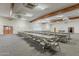 Large, brightly lit hall featuring ample tables and seating at 3330 E Main St # 7, Mesa, AZ 85213