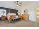 Stylishly decorated main bedroom with a four-poster bed and dark accent wall at 3336 E Linda Ct, Gilbert, AZ 85234