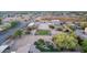 Aerial view of horse property, large shed structure, well-kept lawn, and desert landscaping at 38301 N 15Th Ave, Phoenix, AZ 85086