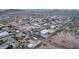 Expansive aerial shot of the residential area showcasing the neighborhood layout and surrounding mountain views at 38301 N 15Th Ave, Phoenix, AZ 85086