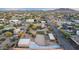 Aerial view of home with horse property, large shed structure and views of the neighborhood at 38301 N 15Th Ave, Phoenix, AZ 85086