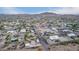 Neighborhood aerial view highlighting community and wide streets with mountain backdrop, ideal for a serene lifestyle at 38301 N 15Th Ave, Phoenix, AZ 85086