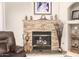 Close up of the stone fireplace with decor at 38301 N 15Th Ave, Phoenix, AZ 85086