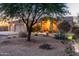 Home with desert landscaping, three car garage, and unique architectural design at 38301 N 15Th Ave, Phoenix, AZ 85086