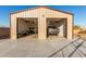 Spacious metal building with two garages, one occupied by a truck at 38301 N 15Th Ave, Phoenix, AZ 85086